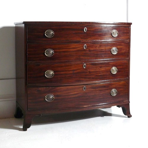 Bow Fronted Georgian Chest Of Drawers In Flame Mahogany 