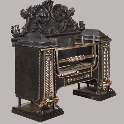 A Superior Geo III Cast & Wrought Iron`Hob` Fire Grate