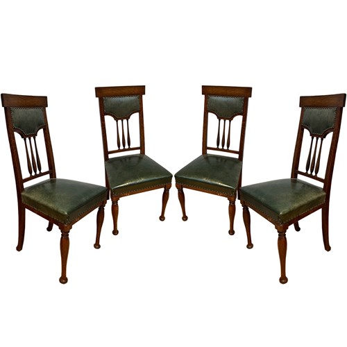 Set Of 4 Oak And Leather Dining Chairs