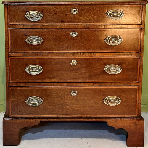 George III Walnut Chest Of Drawers.