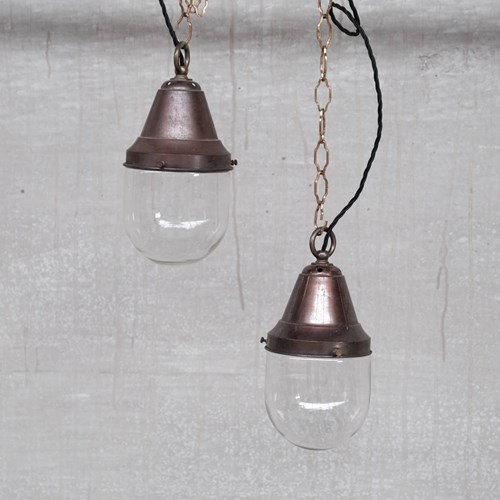 Pair Of Petite Brass And Clear Glass Industrial Pendants