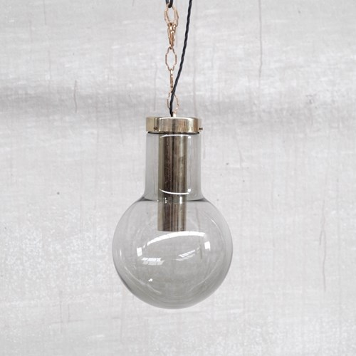 Large Smoked Mid-Century Glass And Brass Pendant Lights By RAAK (2 Available)