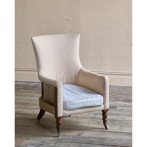 A Regency Country House Armchair In Striped Ticking