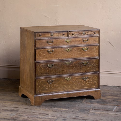 A William And Mary Oak Chest Of Drawers With Inlay.