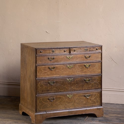 A William And Mary Oak Chest Of Drawers With Inlay.