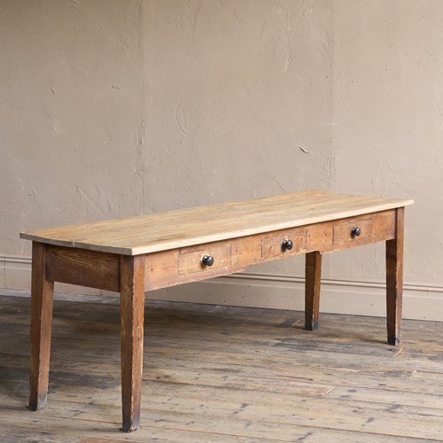A Large Pine Scullery Table With Drawers