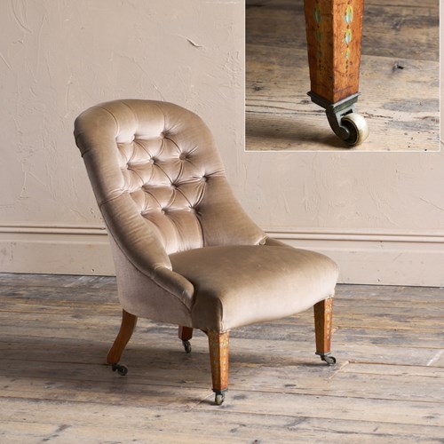 An Occasional Chair With Painted Legs