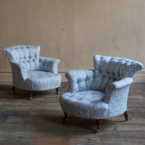 A Pair Of Early Howard And Sons Armchairs In Blue H&S Ticking