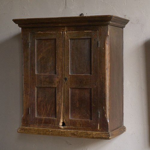 A Distressed Wall Cabinet