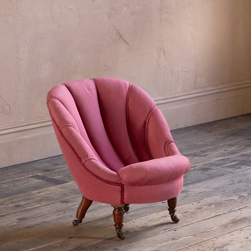 A Diminutive Shell Chair By Hampton & Sons