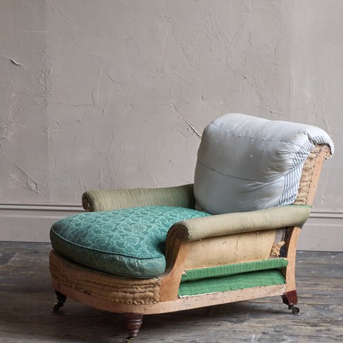 A Howard Style Deep-Seated Armchair By Waring & Gillow