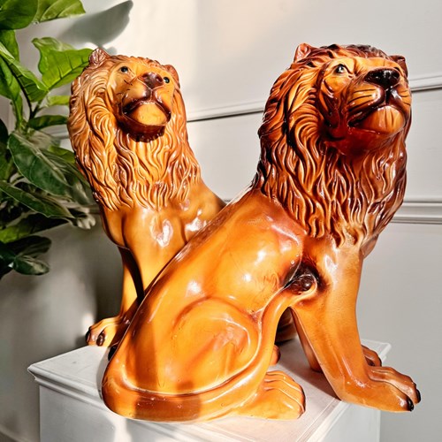 Pair Of Staffordshire Pottery Lions