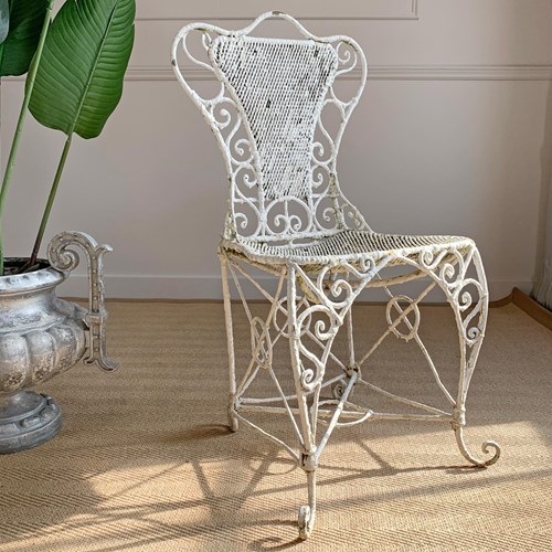 An Ornate Regency Wirework Iron Chair