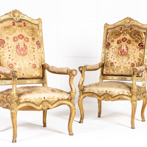 Pair Of French Regence Style Giltwood Armchairs