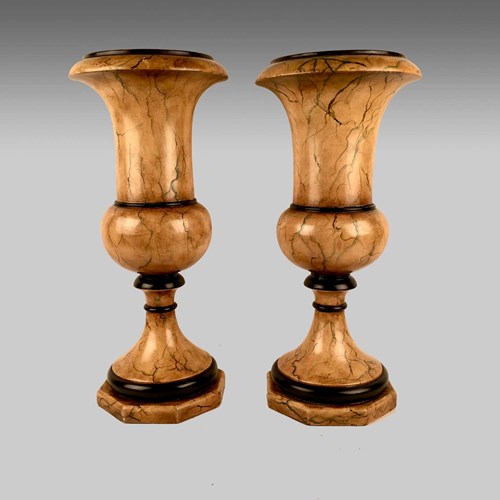 A Pair Of Faux Marble Classical Urns