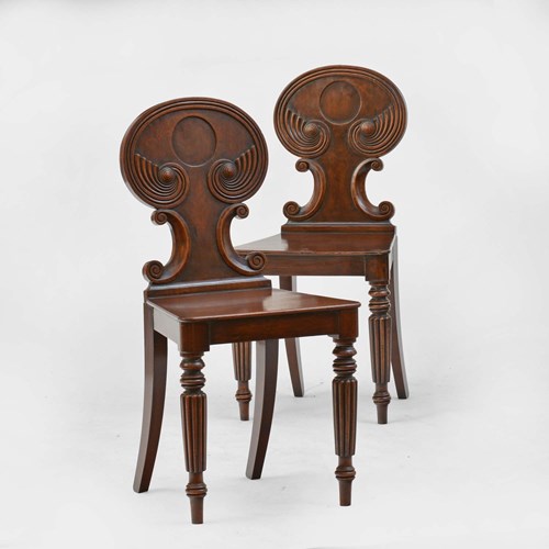 A Pair Of Regency Mahogany Hall Chairs