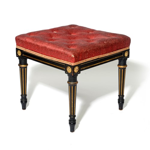 Ebonised and parcel gilt upholstered stool