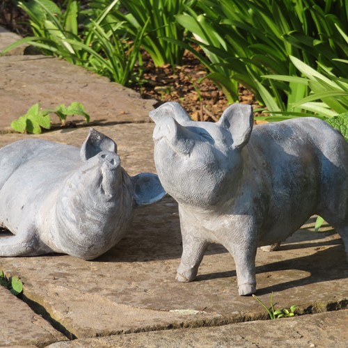 Pair of old lead piglets
