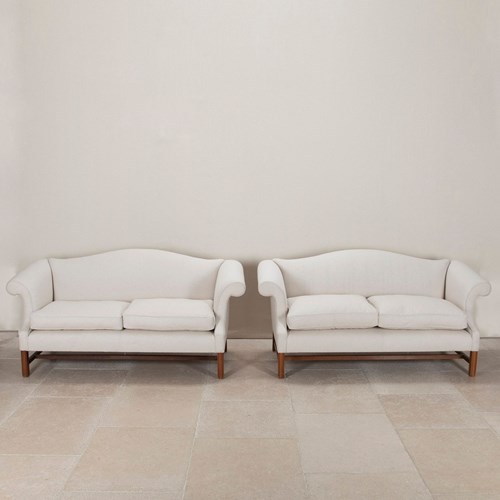 Pair Of 20Th Century English Camel Back Sofas