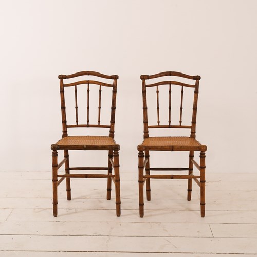 A Pair Of French Cane Chairs