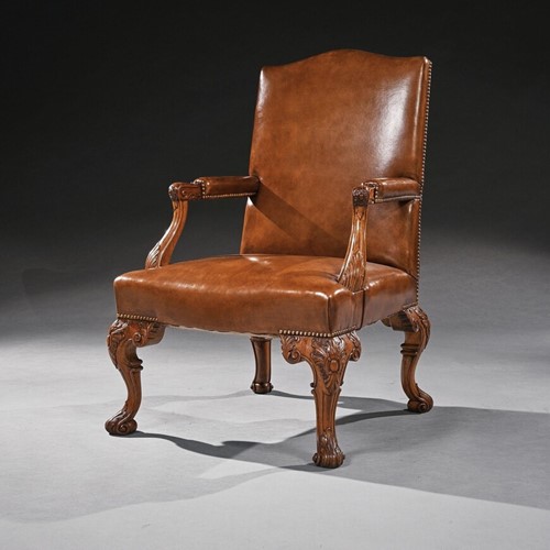20th Century Walnut Carved Leather armchair