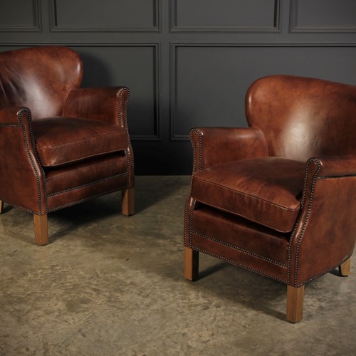 Pair Of Leather Armchairs 