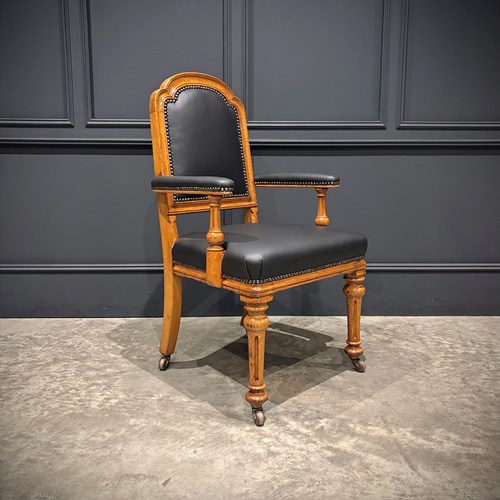 Oak & Leather Armchair By W.Williamson & Sons