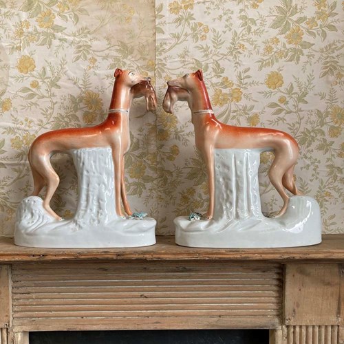 Pair Of Staffordshire Pottery Greyhounds