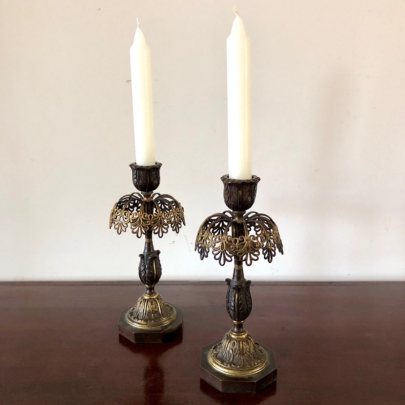 A Pair Of Bronze Candle Sticks -marchand-antiques-6d3b0174-ae74-41b9-90a1-ee94e2ddde18-main-638173341492095099.jpeg