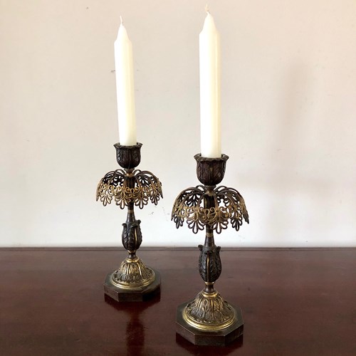 A Pair Of Bronze Candle Sticks 