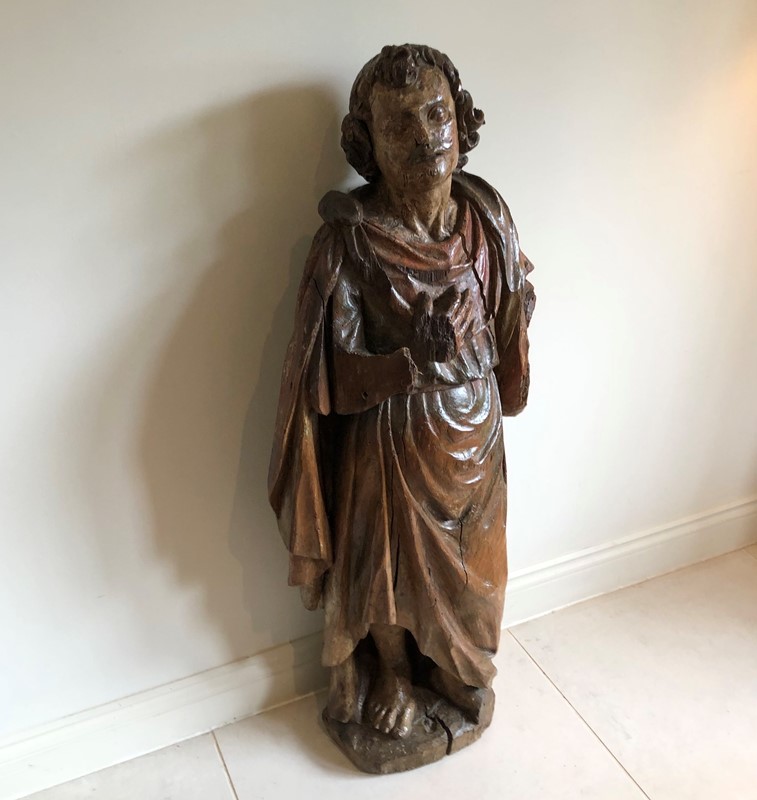 A large 17thC carved wood figure of a saint -marchand-antiques-750a713e-27ca-40b7-9811-c54348d91afd-main-637617085662527658.jpeg
