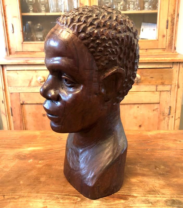A Carved Wooden Bust -marchand-antiques-776732c4-73ed-4d82-8f46-2091bd03ba68-main-638173365708698613.jpeg