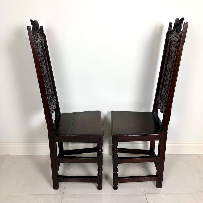 A pair of Quirky Oak Hall / Side Chairs -marchand-antiques-8995e8e7-7dec-492e-b095-1992e8dfc660-main-638025693049146653.jpeg