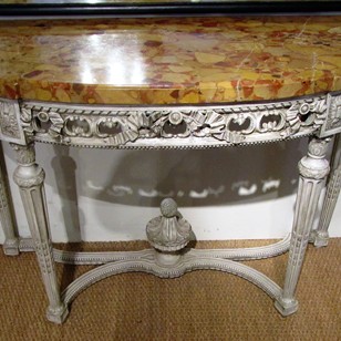 A painted demi lune console