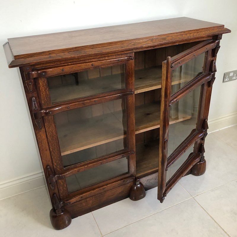An Arts and Crafts Low Bookcase -marchand-antiques-a2db7662-4542-4e5e-a50b-27b60a121a25-main-638025718584499271.jpeg