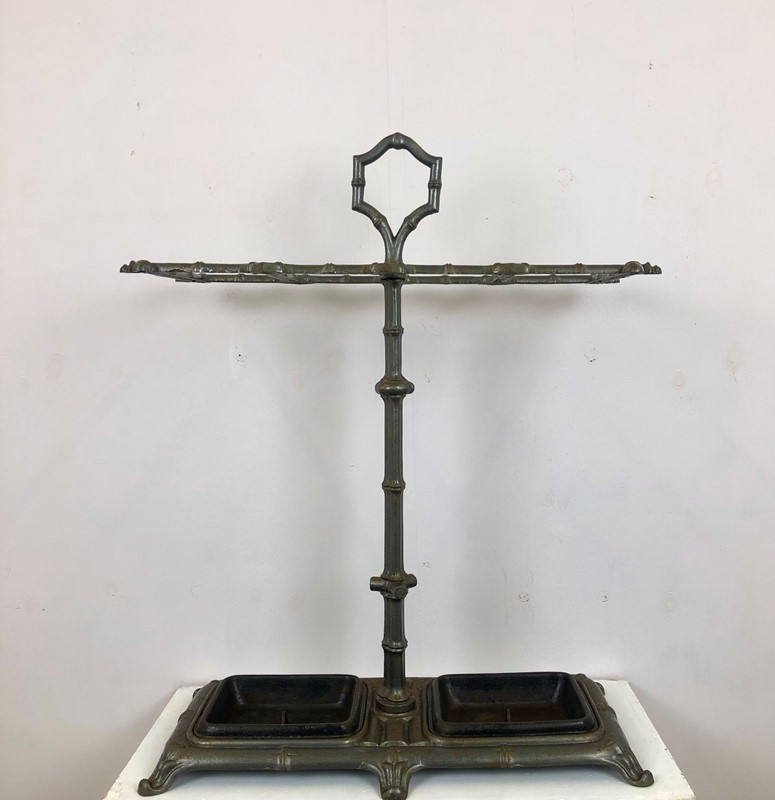 A cast iron Faux bamboo stick stand -marchand-antiques-ec7e453f-cc10-4d1d-a1ae-f3f83b2fcff2-main-637808003589342816.jpeg