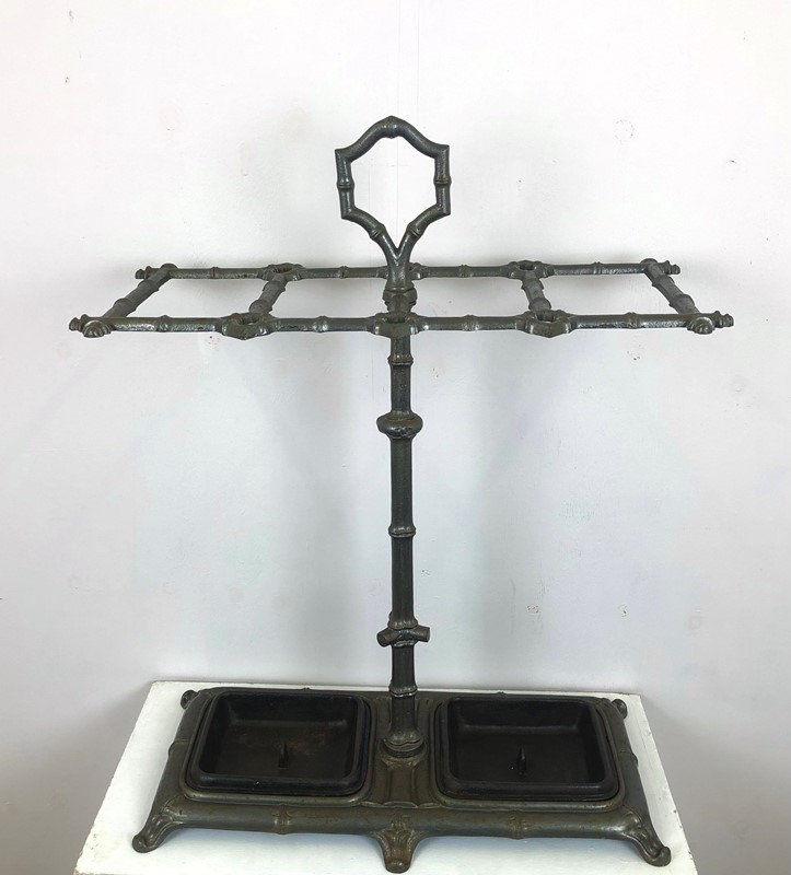A cast iron Faux bamboo stick stand -marchand-antiques-f659112f-f439-4e96-9975-53482fa4c295-main-637808003529499842.jpeg