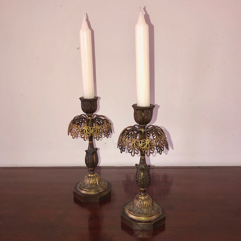 A Pair Of Bronze Candle Sticks -marchand-antiques-f86bf817-1232-4fde-a88b-ab0548526f78-main-638173341746748691.jpeg
