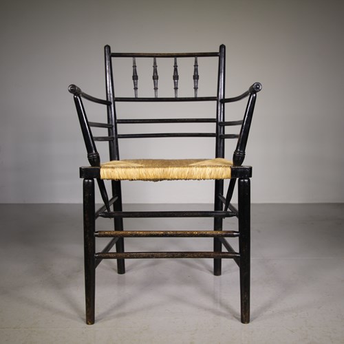 A True 19Th Century Ebonised Antique Sussex Chair By William Morris