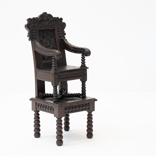 Joined Oak Carved Child’S Highchair On Stand