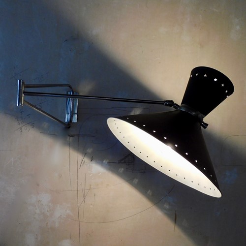 large articulated wall light by Rene Mathieu 
