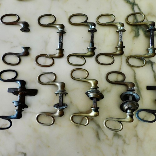 A Run Of 9 Pairs Of French Brass Door Handles 