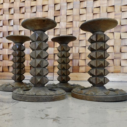 4 Oak Candlesticks In The Manner Of  Charles Dudouyt