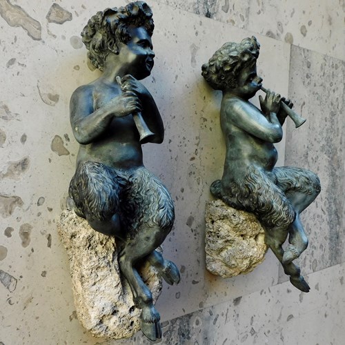 A Pair Of Bronze Faun Sculptures 