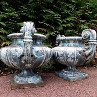 A very large pair of French enamelled urns 