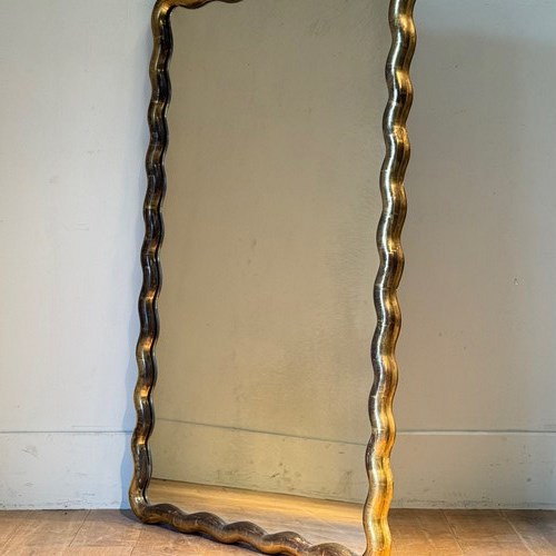 C1860 A Rare French Wavy Gilt Mirror 