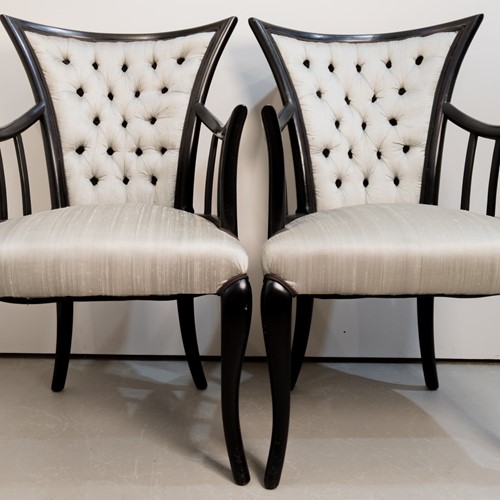 Circa 1928 A Pair of French ebonised chairs