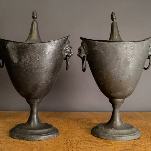 A Mid 19th Century pair of Pewter Chestnut Urns