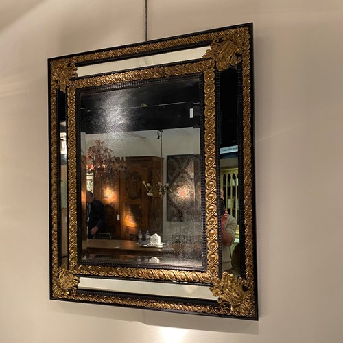 C1850 A Fine French Ebonised Rippled Repousse Brass Mirror