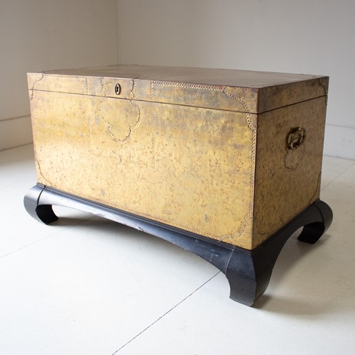 Circa 1960 A Spanish Brass Trunk on Ebonized Base